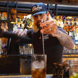 Bar staff wearing our BSMC Garage Cap - Navy/White