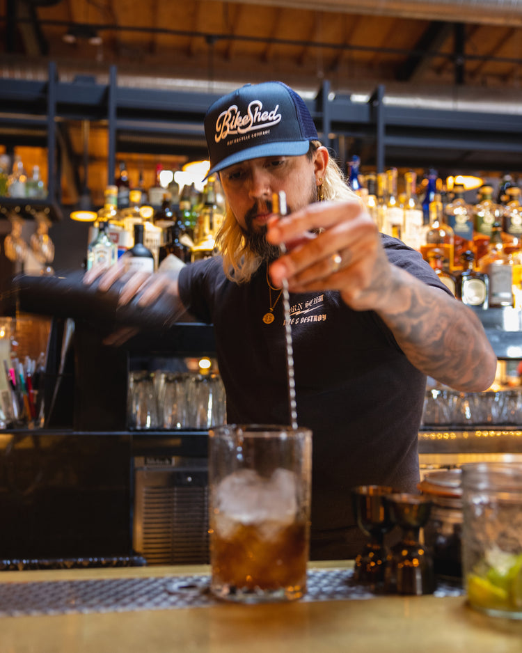 Bar staff wearing our BSMC Garage Cap - Navy/White