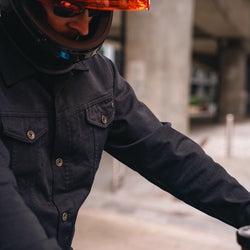 Gareth sitting on a Yamaha XSR wearing our BSMC Denim Jacket - Cordura Black