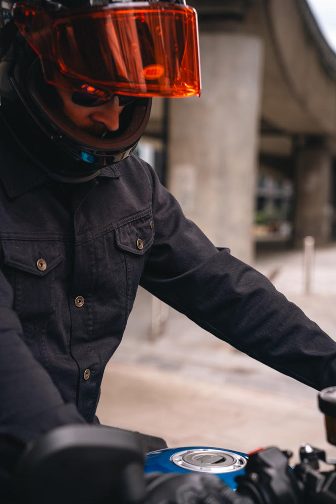 Gareth sitting on a Yamaha XSR wearing our BSMC Denim Jacket - Cordura Black