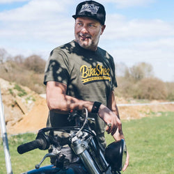 Dan standing in the sun with his Yamaha wearing our BSMC Classic T-Shirt - Green