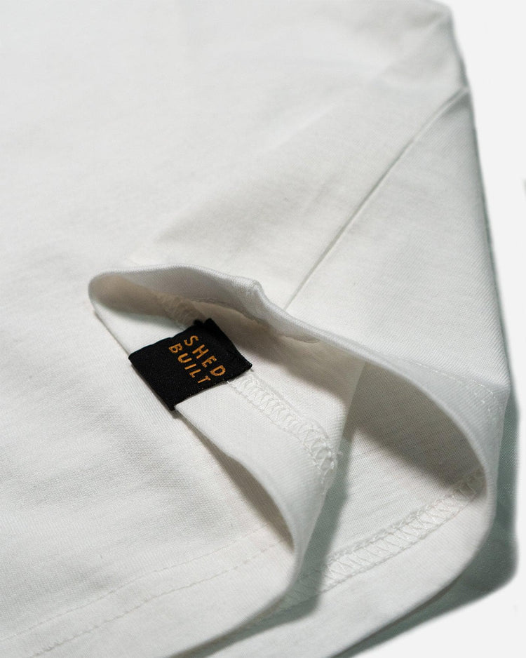 Hem tag close up of our BSMC Company T-Shirt - Off White