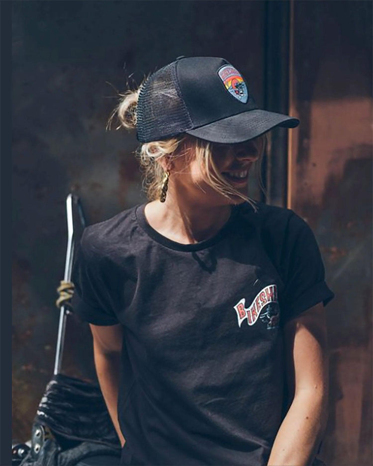 Lori wearing our BSMC Dead Dakar Doug T Shirt - Black & Dead Dakar Doug Cap - Black