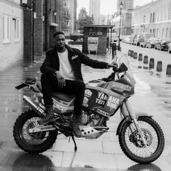 Model sitting on his Yamaha Tenere wearing our BSMC Embroidered Club Waffle - Ecru