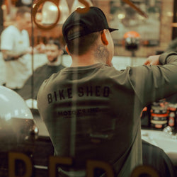 Isaac cutting hair while wearing our BSMC Estd. LS220P - Khaki