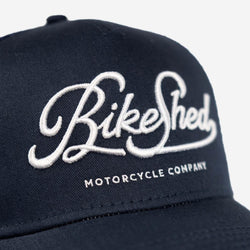 BSMC Garage Cap - Navy/White, logo close up