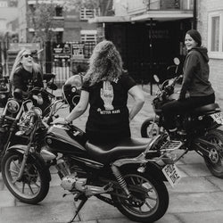 Anna chatting while wearing our BSMC Handmade T Shirt - Black & White
