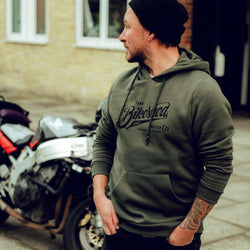 Donny wearing our BSMC Inc. Overhead Hoodie - Khaki Green