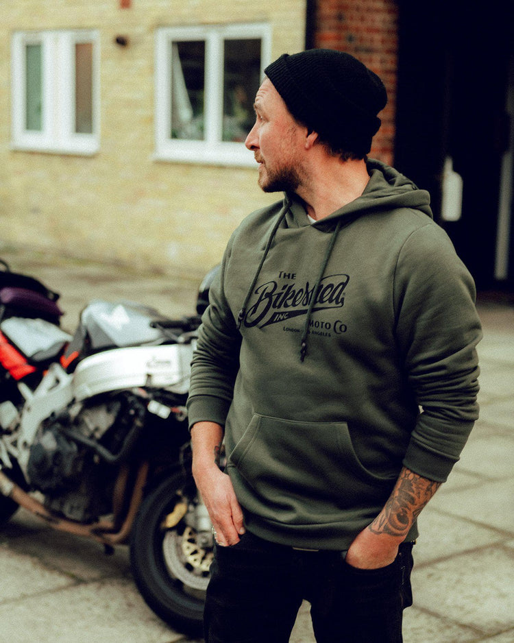 Donny wearing our BSMC Inc. Overhead Hoodie - Khaki Green
