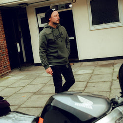 Donny wearing our BSMC Inc. Overhead Hoodie - Khaki Green