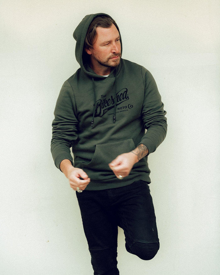Donny wearing our BSMC Inc. Overhead Hoodie - Khaki Green