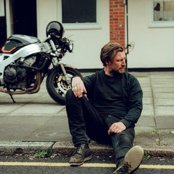 Donny posing while wearing our BSMC 'Motorcycles Saved My Life' Sweatshirt - WASHED BLACK