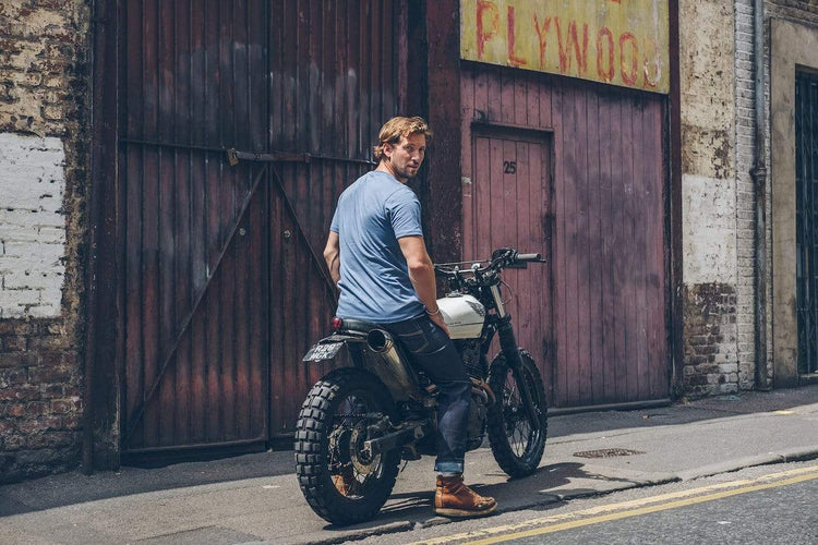 Model sitting on his Honda wearing our BSMC Resistant - BSR01 Jean - Raw Indigo