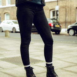 Ellie wearing our BSMC Resistant Women's Skinny Jean - Black