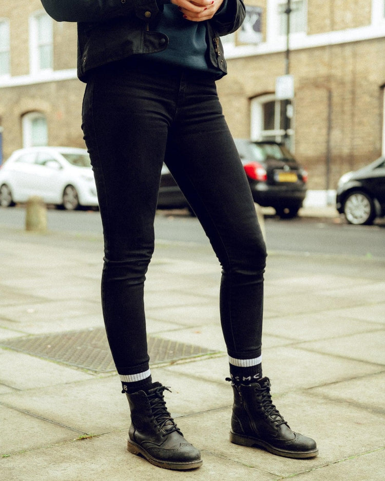 Ellie wearing our BSMC Resistant Women's Skinny Jean - Black
