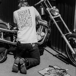 James working on his bike wearing our BSMC Toolkit T Shirt - White