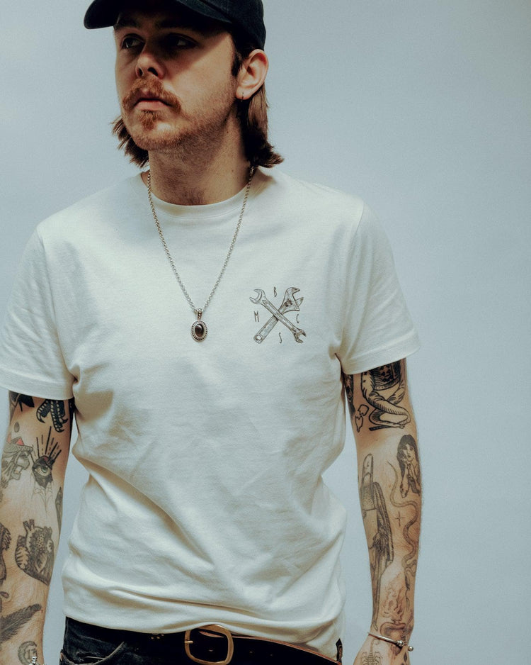 James wearing our BSMC Toolkit T Shirt - White