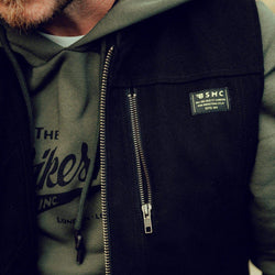 Donny wearing our BSMC Utility Vest - Black, close up