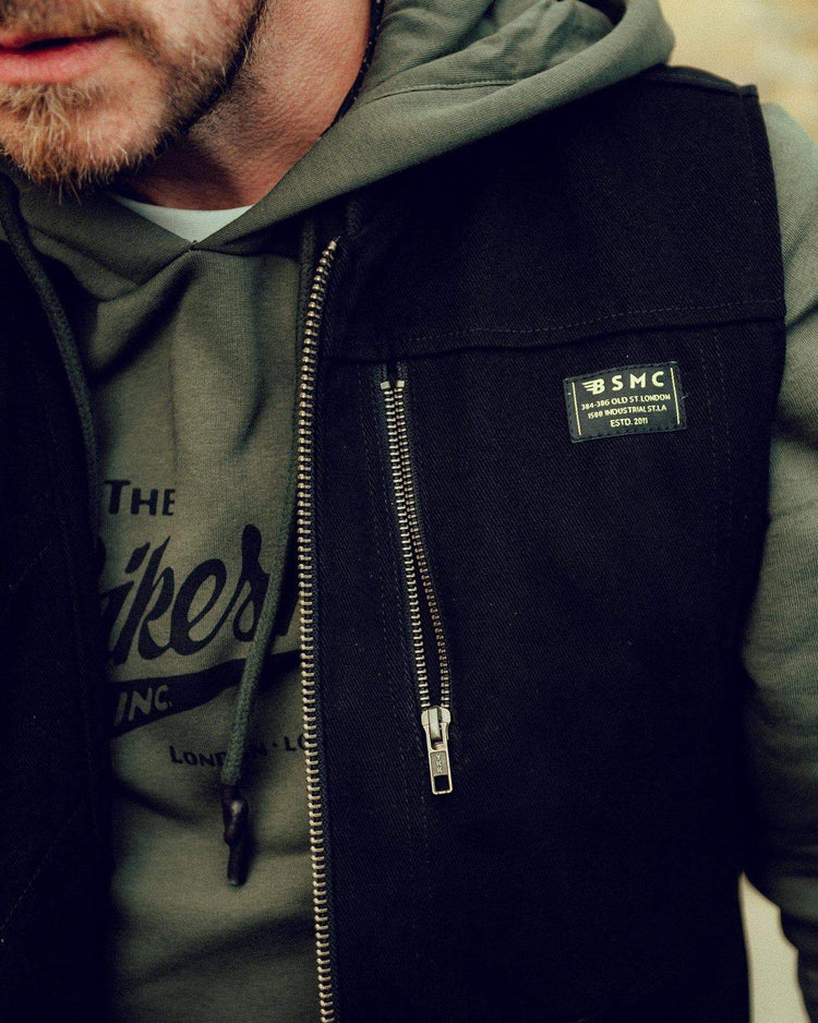 Donny wearing our BSMC Utility Vest - Black, close up