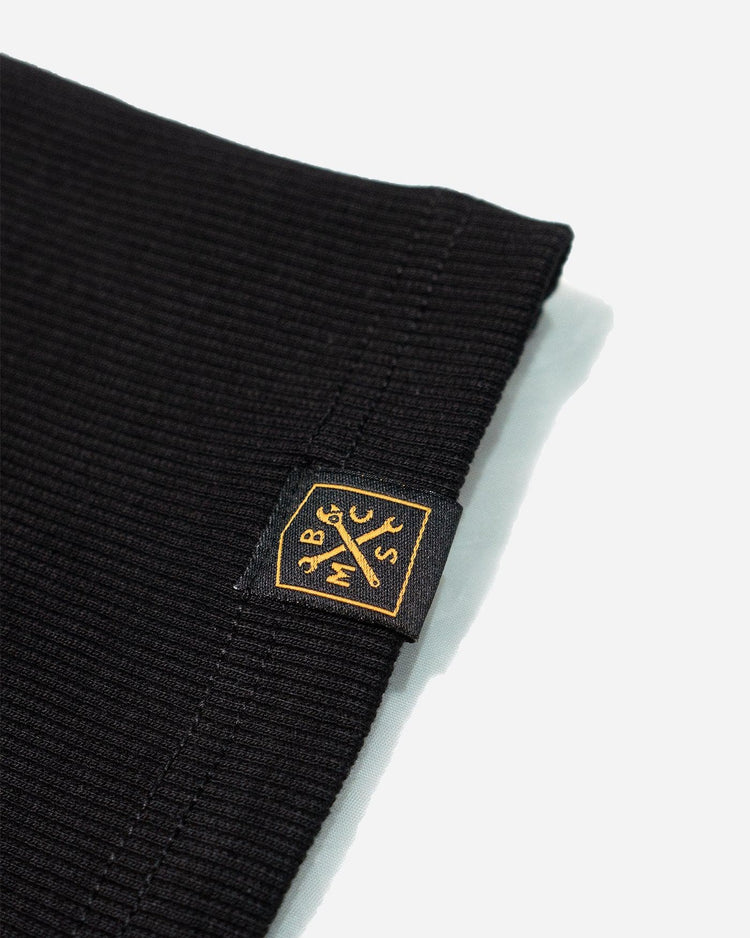 BSMC Women's Garage Vest - Black, hem tag close up