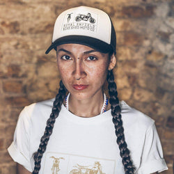 Model wearing BSMC x Royal Enfield Aspect Cap - Black & White