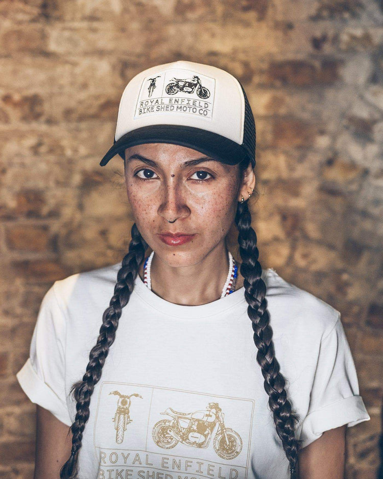 Model wearing BSMC x Royal Enfield Aspect Cap - Black & White
