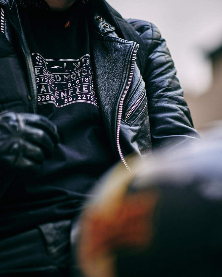 BSMC x Royal Enfield Vinplate T Shirt - Black, close up on Donny