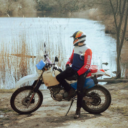 Harry wearing our BSMC XR Race Jersey - WHITE/BLUE/RED sitting on his dirt bike