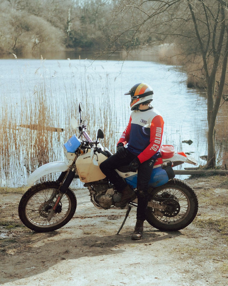 Harry wearing our BSMC XR Race Jersey - WHITE/BLUE/RED sitting on his dirt bike