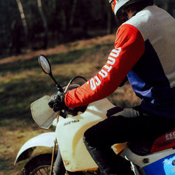 Harry wearing our BSMC XR Race Jersey - WHITE/BLUE/RED riding off road