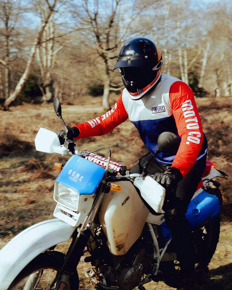 Harry wearing our BSMC XR Race Jersey - WHITE/BLUE/RED riding off road