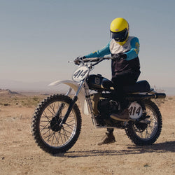 Model wearing our BSMC XT Race Jersey - BLUE/WHITE/BLACK on his bike