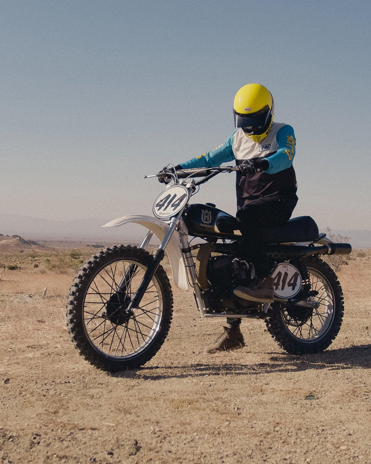 Model wearing our BSMC XT Race Jersey - BLUE/WHITE/BLACK on his bike