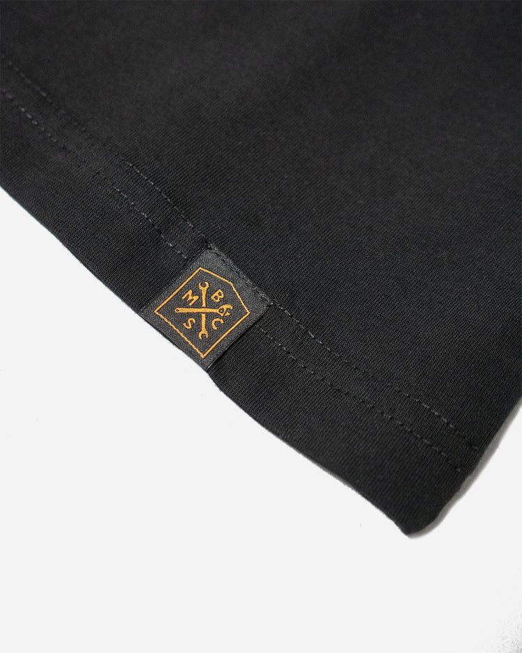 BSMC Deco Pocket T Shirt - Black, hem tag close up