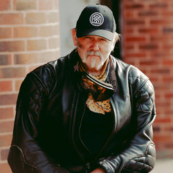 Member wearing our BSMC Roundel Patch Cap - Black