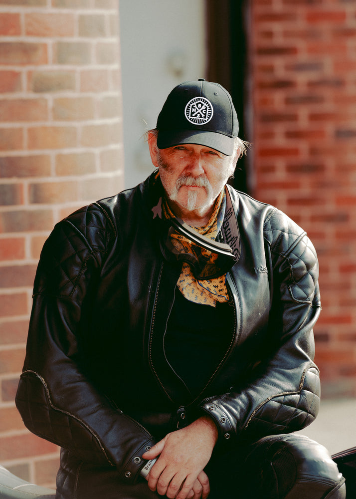 Member wearing our BSMC Roundel Patch Cap - Black