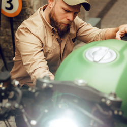 Jimbo inspecting his bike wearing our BSMC Ripstop Utility Shirt MKII - TAN