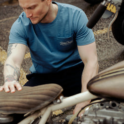 Steve inspecting a chopper wearing our BSMC Chain Slub T Shirt - Blue
