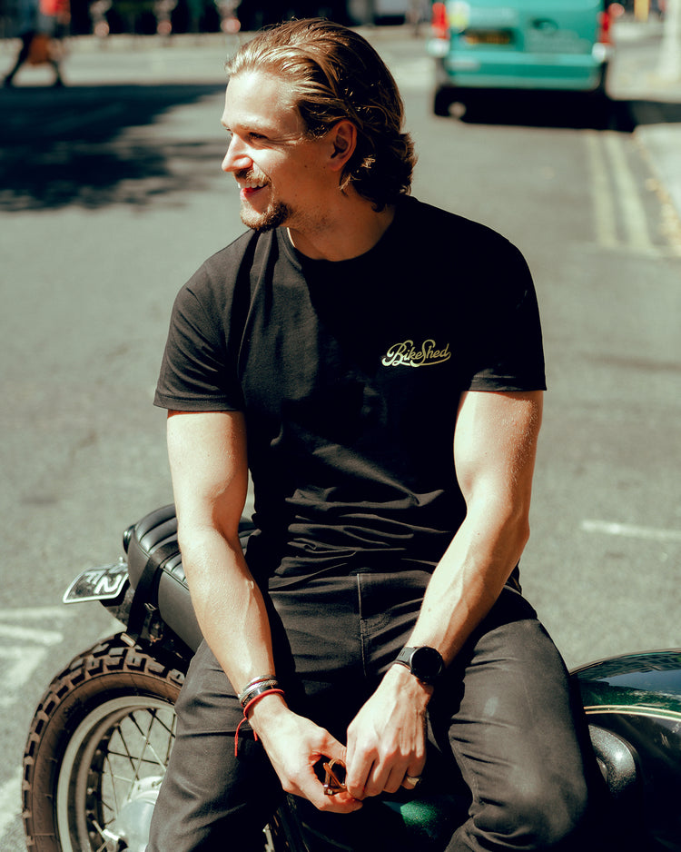 Harry taking a rest while wearing BSMC Garage T Shirt - Black & Gold