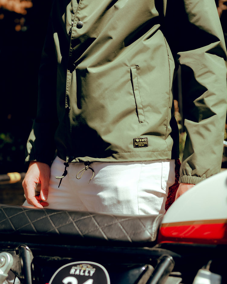 Joe wearing our BSMC Company Coach Jacket - Khaki Green