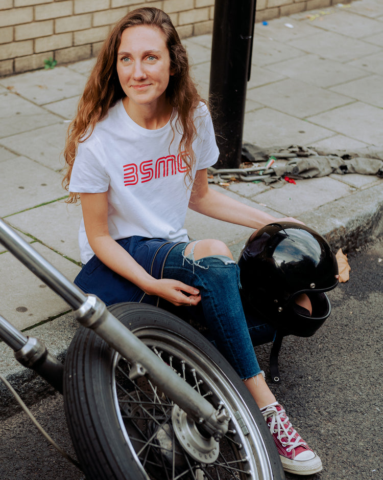 Leoma wearing our BSMC Women's '77 T Shirt - White/Red