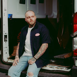 Liam wearing our BSMC Garage Patch Shirt - Navy