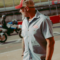Dan wearing our BSMC Garage Patch Shirt - Blue