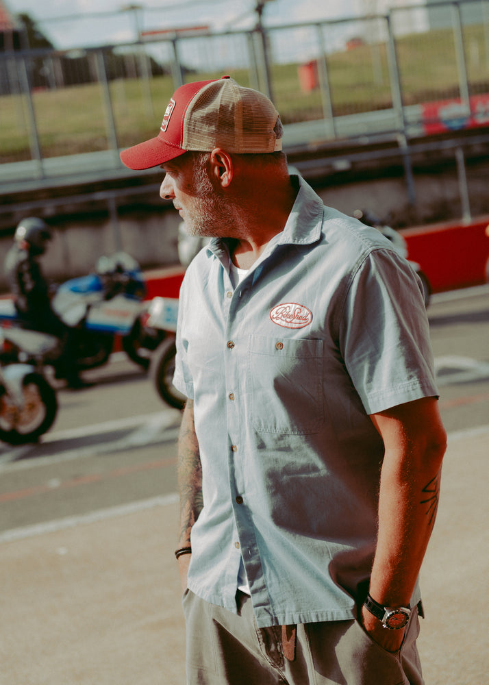 Dan wearing our BSMC Garage Patch Shirt - Blue