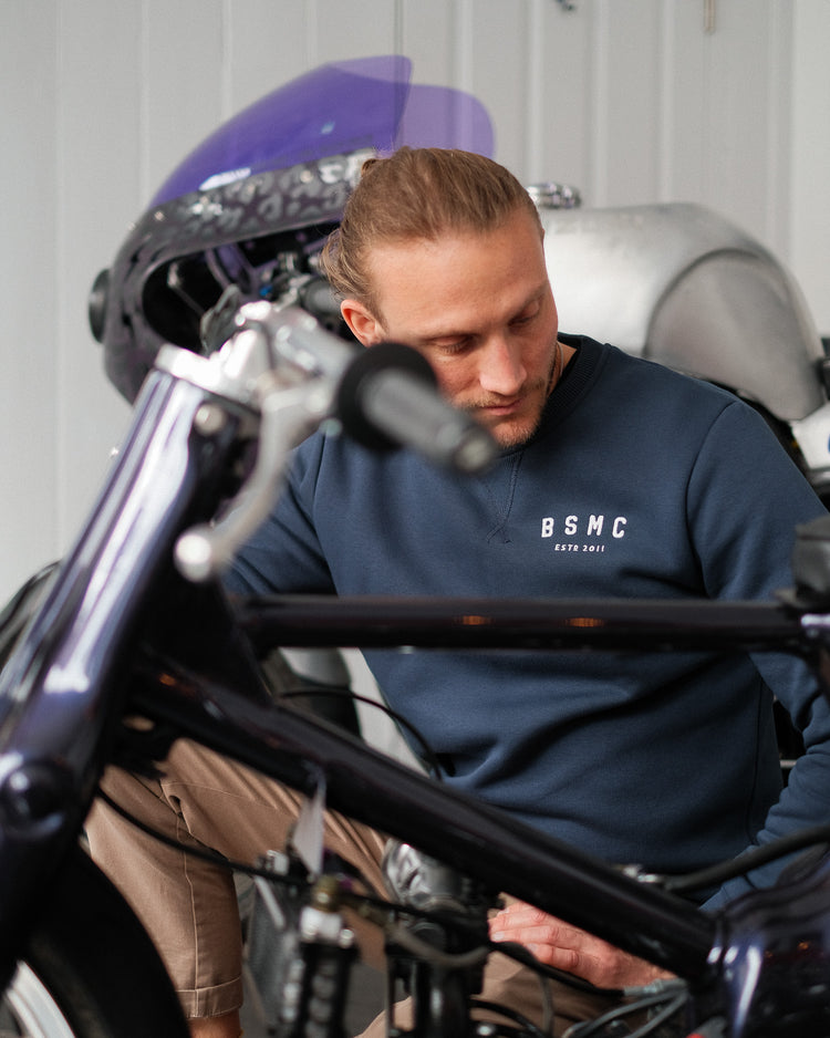 Steve wearing ESTD Embroidered Sweatshirt, front