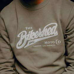 Kyle wearing Inc Applique Sweatshirt Khaki