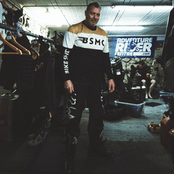 Dan wearing our BSMC Wing Race Jersey - Gold getting ready to ride